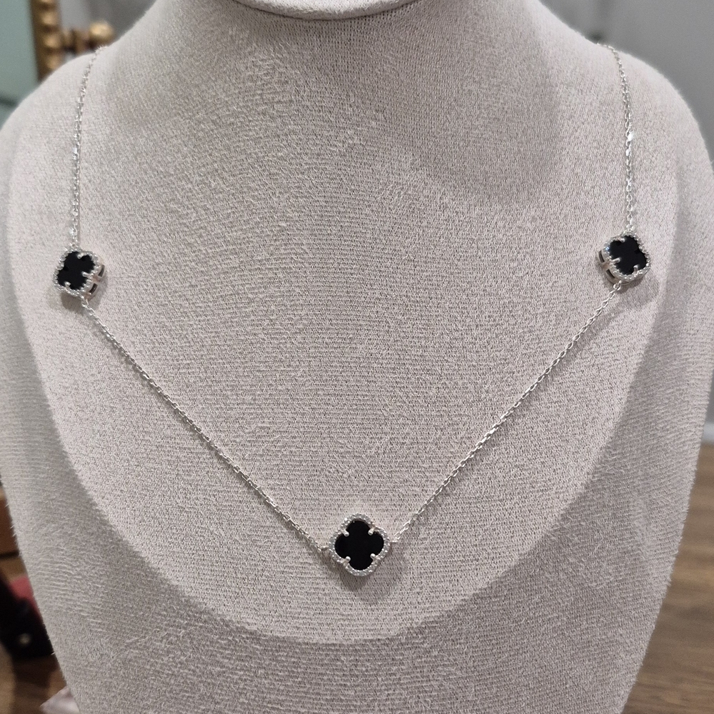 Elegant Silver and Black Clover Necklace